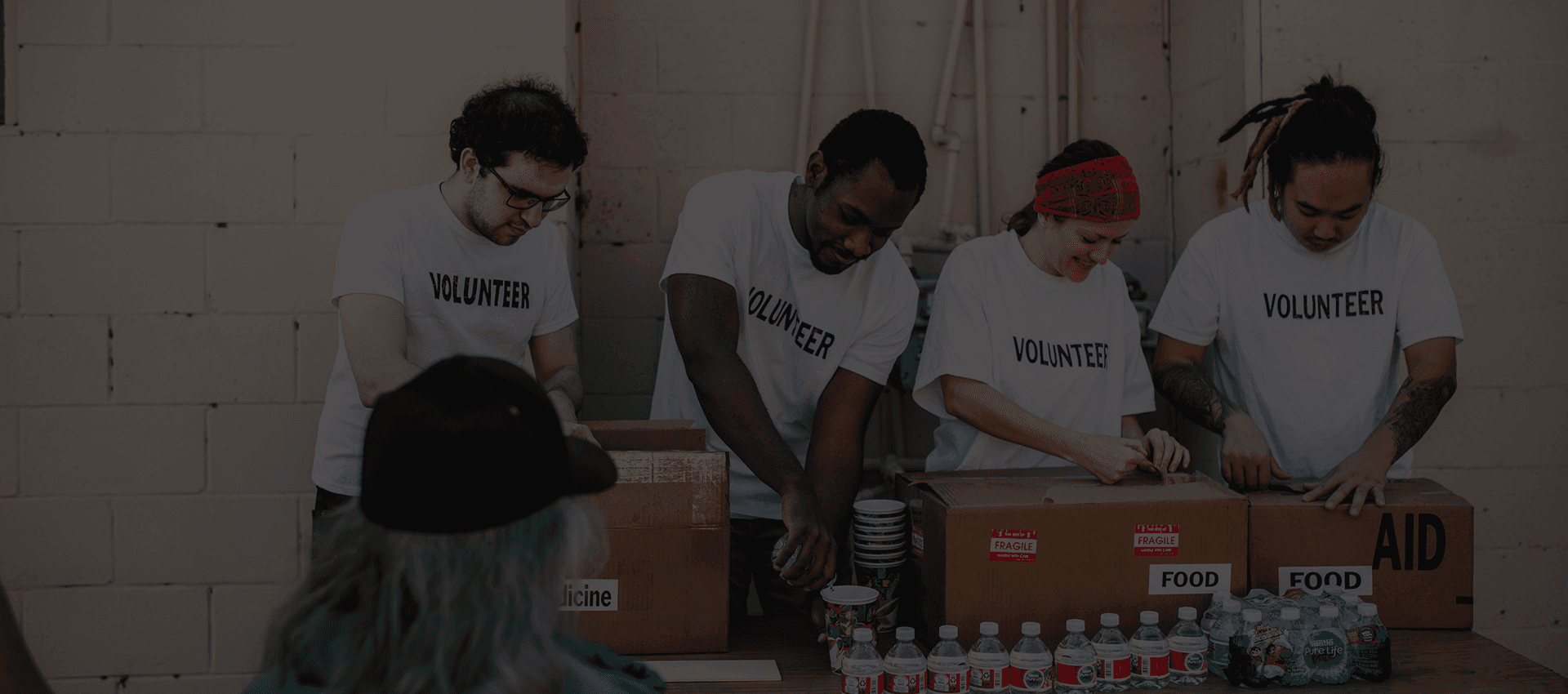 Volunteers packaging food donations